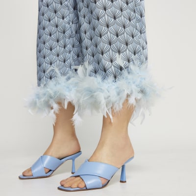 Plus blue feather print hem trousers