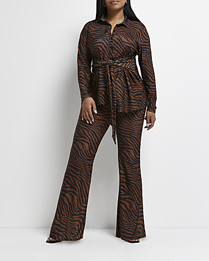 Plus brown animal print flared trousers