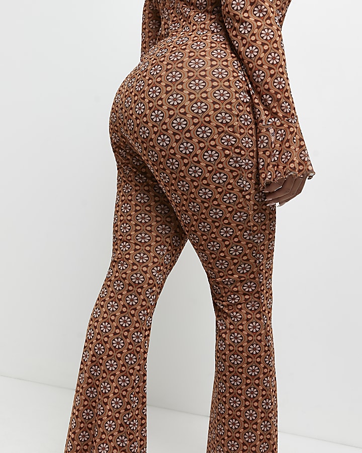 Plus brown floral flared trousers