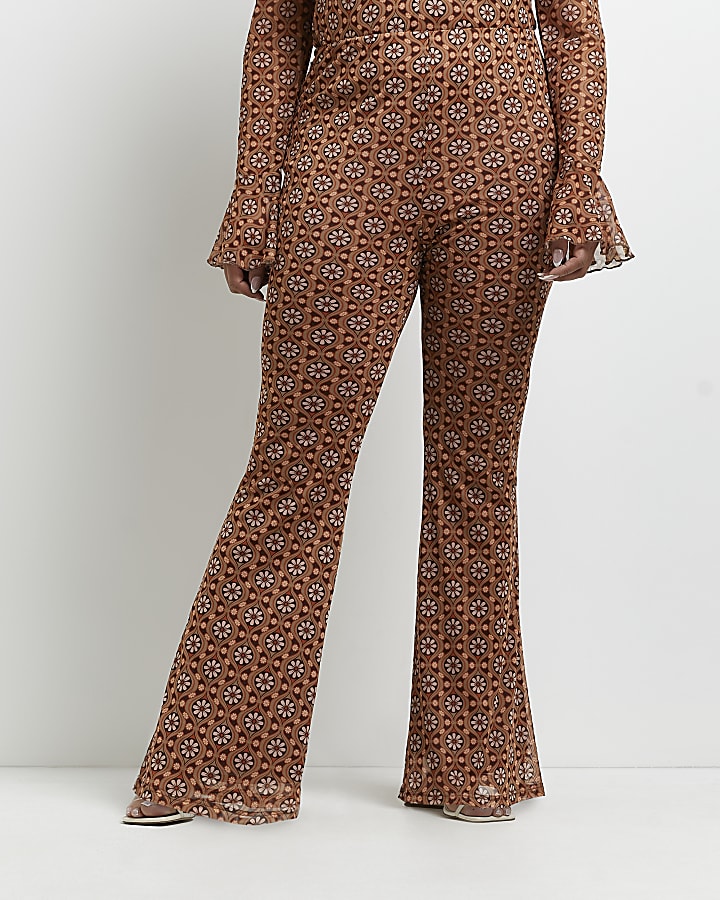 Plus brown floral flared trousers