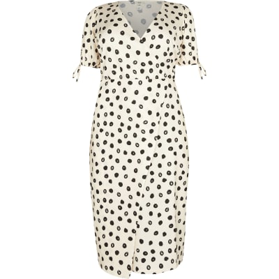 Plus cream spot print asymmetric midi dress