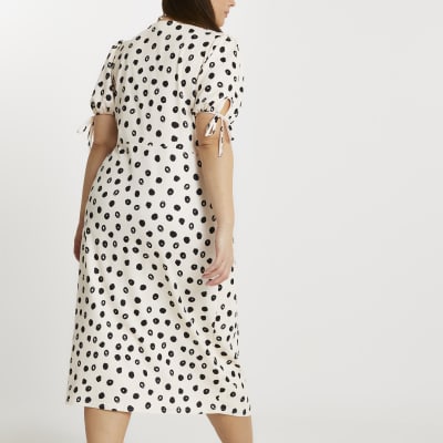 Plus cream spot print asymmetric midi dress
