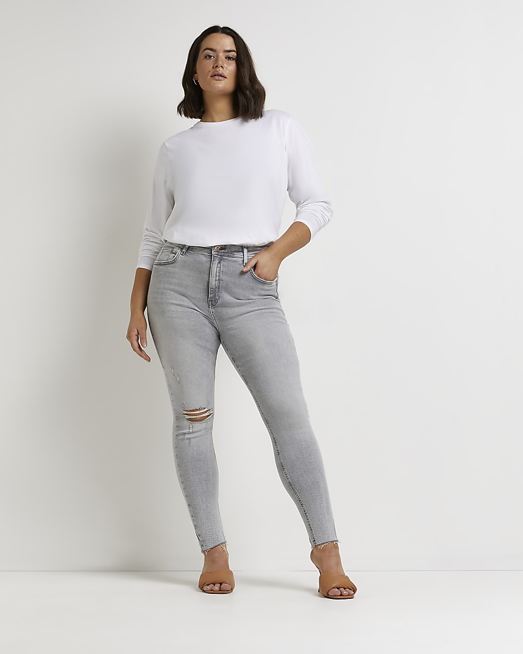 Plus grey ripped mid rise skinny jeans