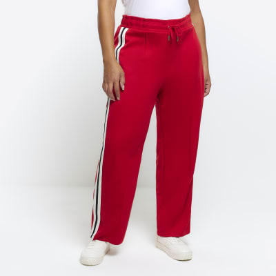 Red and store white striped joggers