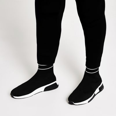 black sock style trainers