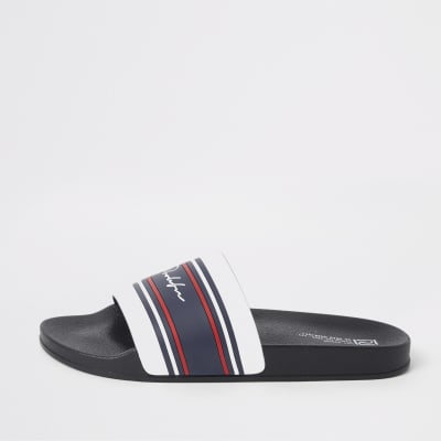 red and blue nike slides
