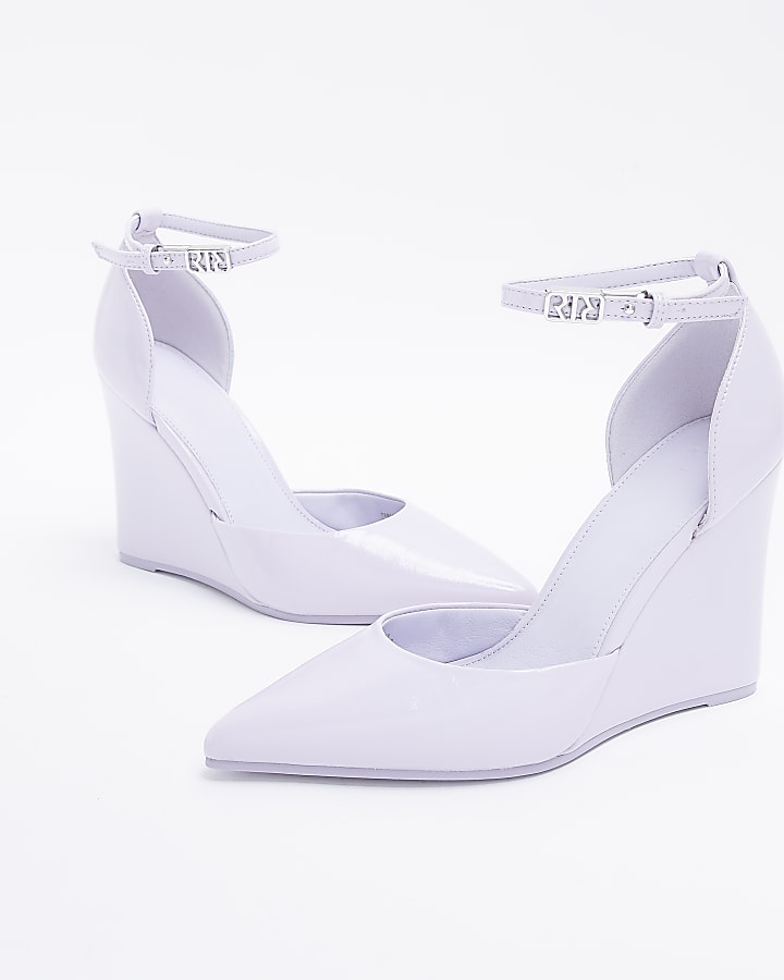 Purple heeled wedge shoes