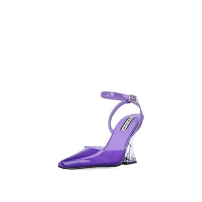 360 degree animation of product Purple perspex heeled shoes frame-0