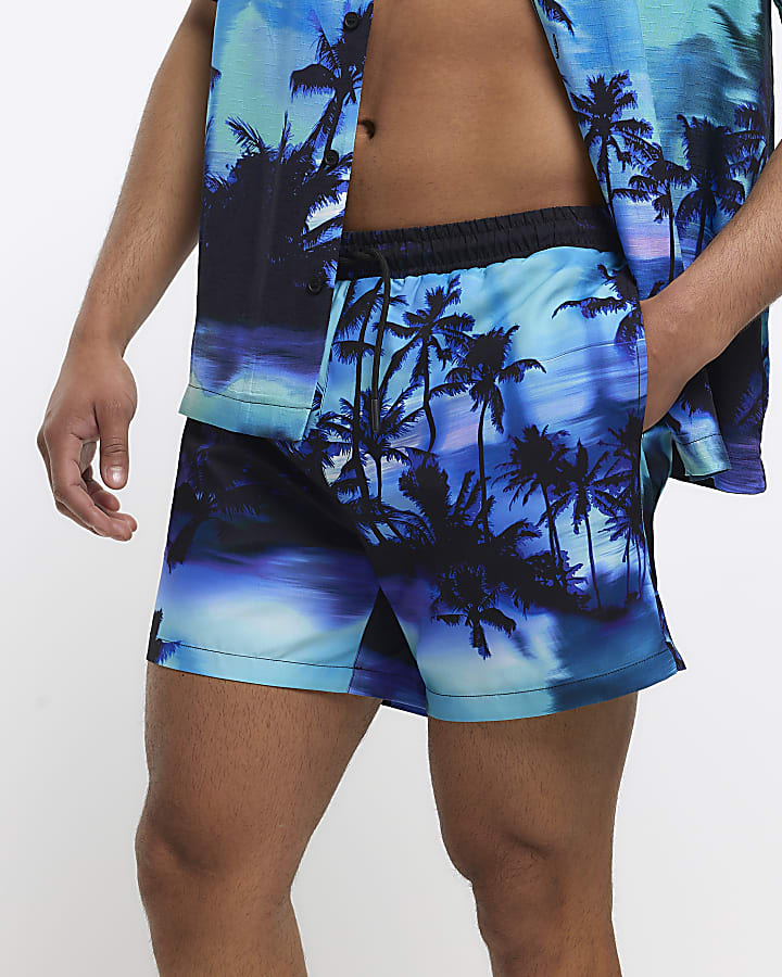 Purple regular fit graphic print swim shorts