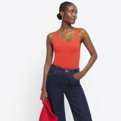 https://images.riverisland.com/is/image/RiverIsland/red-asymmetric-tank-top_904570_main