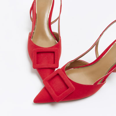 Red buckle sling back heeled court shoes