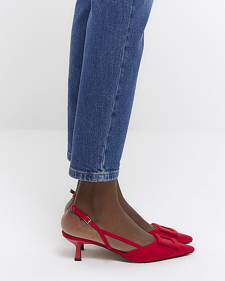 Red buckle sling back heeled court shoes