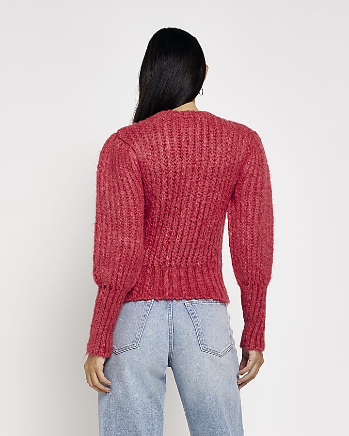 Red cable knit jumper
