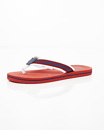 360 degree animation of product Red canvas stripe flip flops frame-0