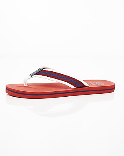 360 degree animation of product Red canvas stripe flip flops frame-23