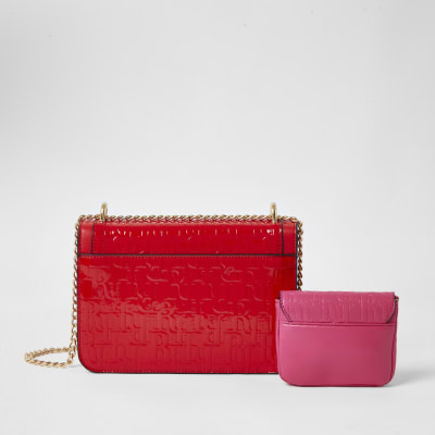 Red embossed satchel with detachable pouch