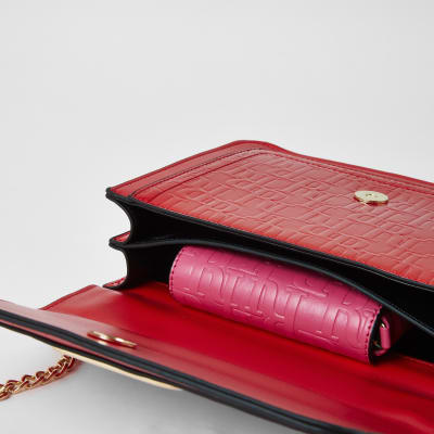 Red embossed satchel with detachable pouch