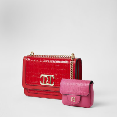 Red embossed satchel with detachable pouch