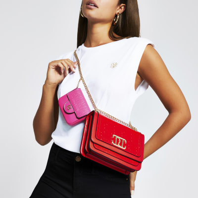 Red embossed satchel with detachable pouch