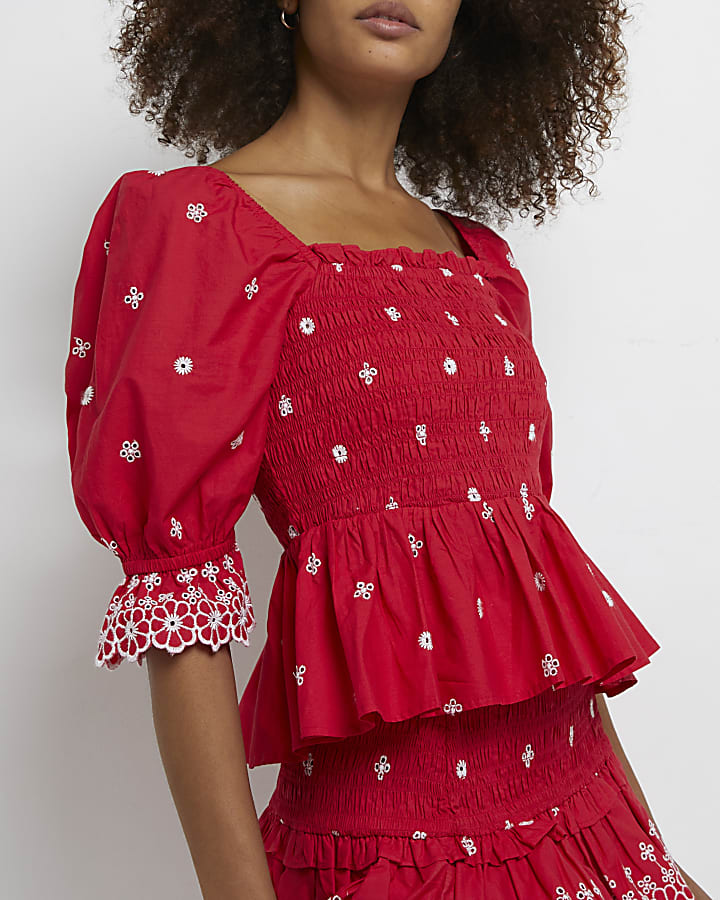 Red embroidered floral peplum top