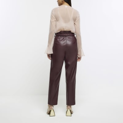 Red faux leather paperbag trousers | River Island