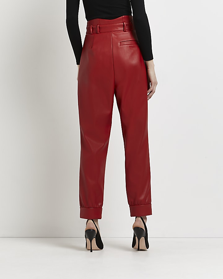 Red faux leather tapered trousers