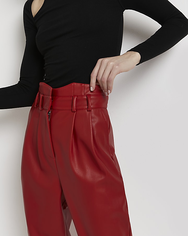 Red faux leather tapered trousers