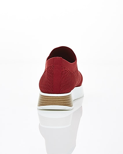360 degree animation of product Red knitted runner trainers frame-15