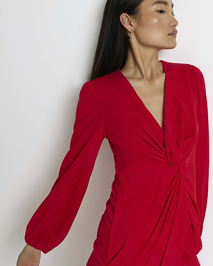 Red long sleeve twist midi dress