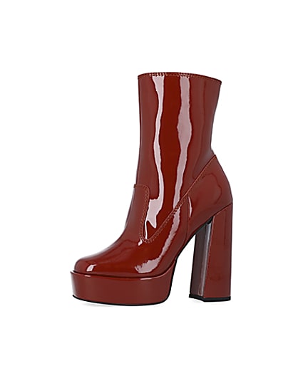 360 degree animation of product Red patent platform heeled ankle boots frame-2