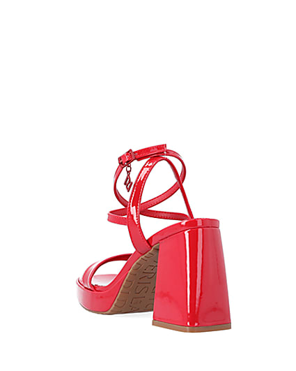 360 degree animation of product Red patent platform heeled sandals frame-10