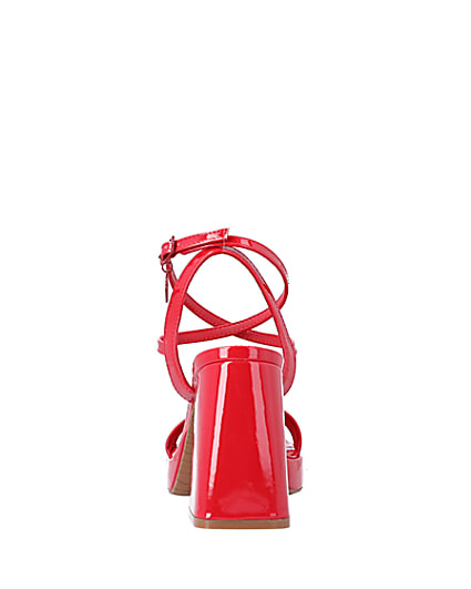 360 degree animation of product Red patent platform heeled sandals frame-12