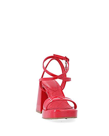 360 degree animation of product Red patent platform heeled sandals frame-23