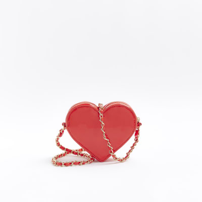 Red quilted heart cross body bag | River Island