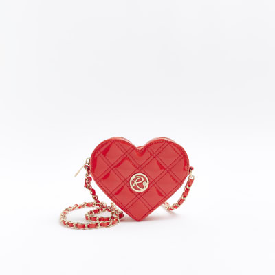 Red quilted heart cross body bag River Island