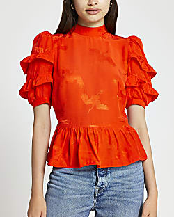 Red short sleeve open back frill top