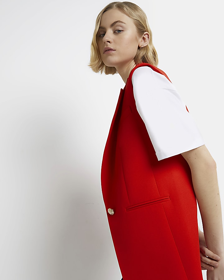 Red tailored sleeveless blazer