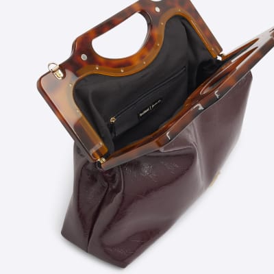 Red tortoiseshell handle clutch bag River Island
