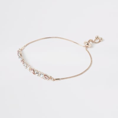 Rose gold colour diamante lariat bracelet | River Island