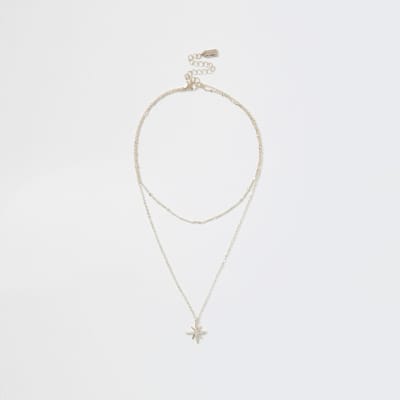 Rose gold colour star charm necklace