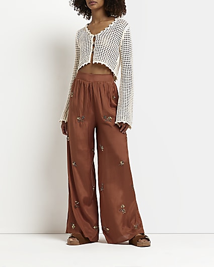 Rust embellished wide leg trousers