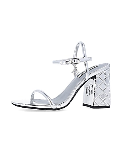360 degree animation of product Silver embossed heeled strappy sandals frame-2