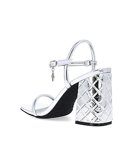 360 degree animation of product Silver embossed heeled strappy sandals frame-6