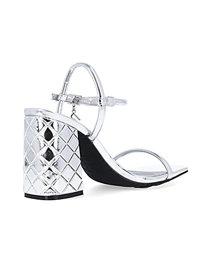 360 degree animation of product Silver embossed heeled strappy sandals frame-12