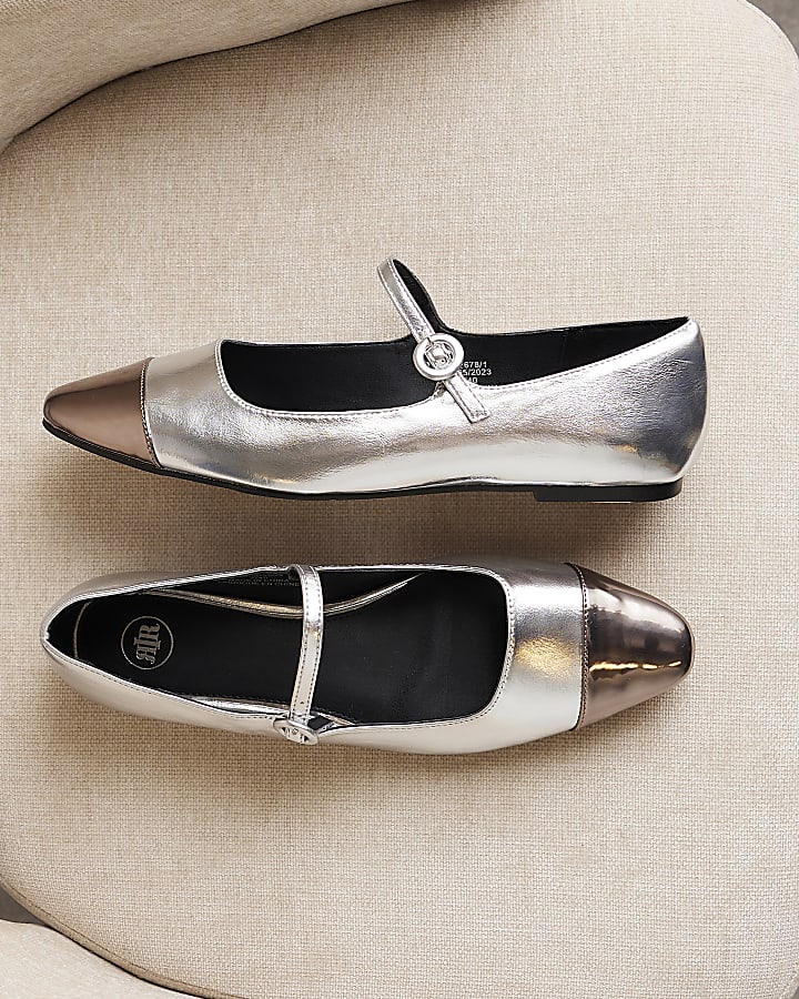Silver flat ballet shoes