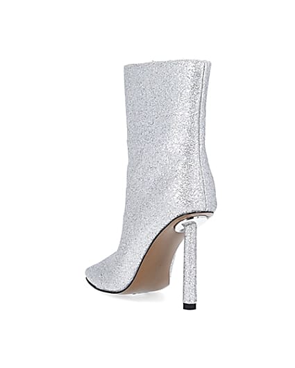 360 degree animation of product Silver glitter heeled ankle boots frame-7
