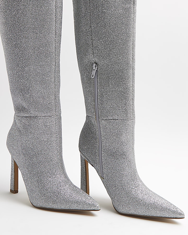 Silver glitter knee high heeled boots