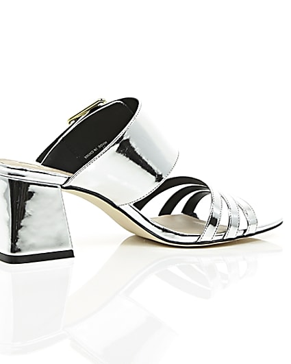 360 degree animation of product Silver metallic strappy mules frame-11