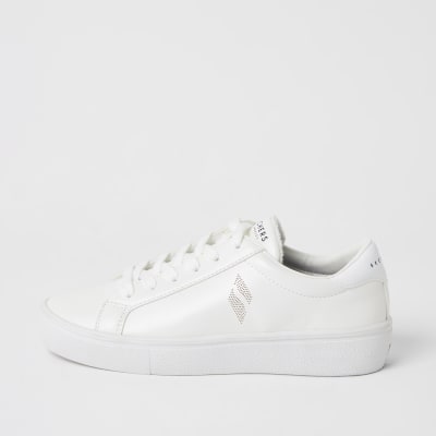 white sketcher trainers