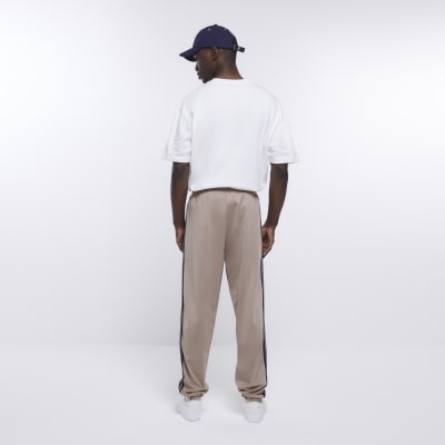 Stone slim fit striped tapered joggers River Island